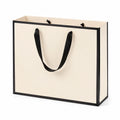 Sac cadeau 32 x 12 x 25 cm en papier crème et noir à poignées ruban style élégant