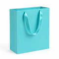 Sac cadeau 26 x 12 x 32 cm en papier turquoise avec poignées ruban